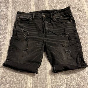 American Eagle Outfitters, young men’s black denim, distressed shorts, size 33W.